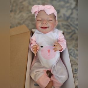 Reborn All Vinyl little girl doll, with accessories